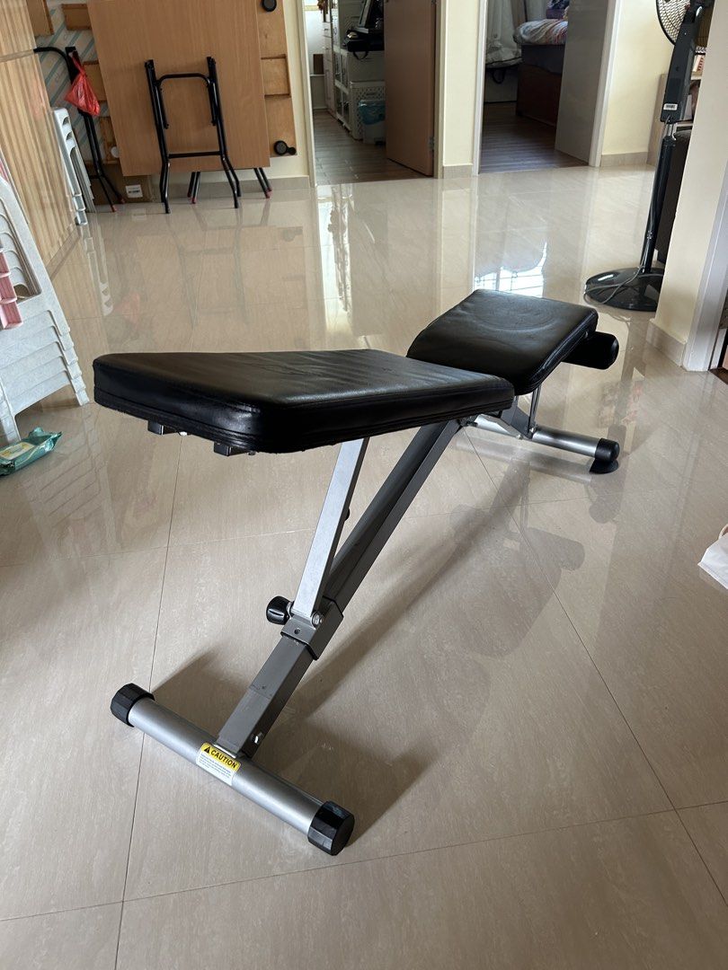 Adjustable Bench solid build (Category: Weights & Dumbbells) located in Singapore. Submitted by pasirrismonkey (Listing ID 1465999501, Image 9). Description: Adjustable workout bench. Multiple incline and flat settings. Foam leg rollers at the front for secure workouts during sit-ups and bench presses. Sturdy metal build with adjustable knobs on the support bars. Easy to fold or adjust angles for home gym routines. Self collection .