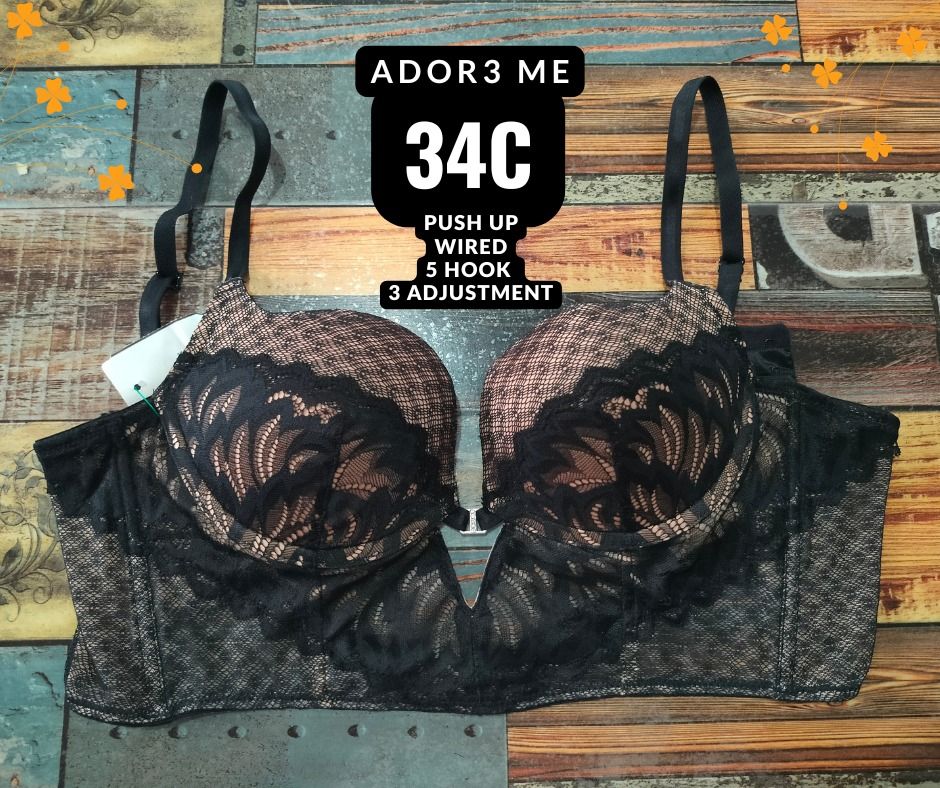 Adore Me Push Up Wired Bra Size 34C (Category: Undergarments & Loungewear) located in Manila. Submitted by siashop. (Listing ID 1465998973, Image 1). Description: - Brand: Ador3 Me - Size: 34C - Design: Black lace over nude patterned fabric with a deep V neckline - Support: Wired, push-up, and longline silhouette - Closure: 5-hook closure with 3 adjustable settings - Straps: Fully adjustable shoulder straps.