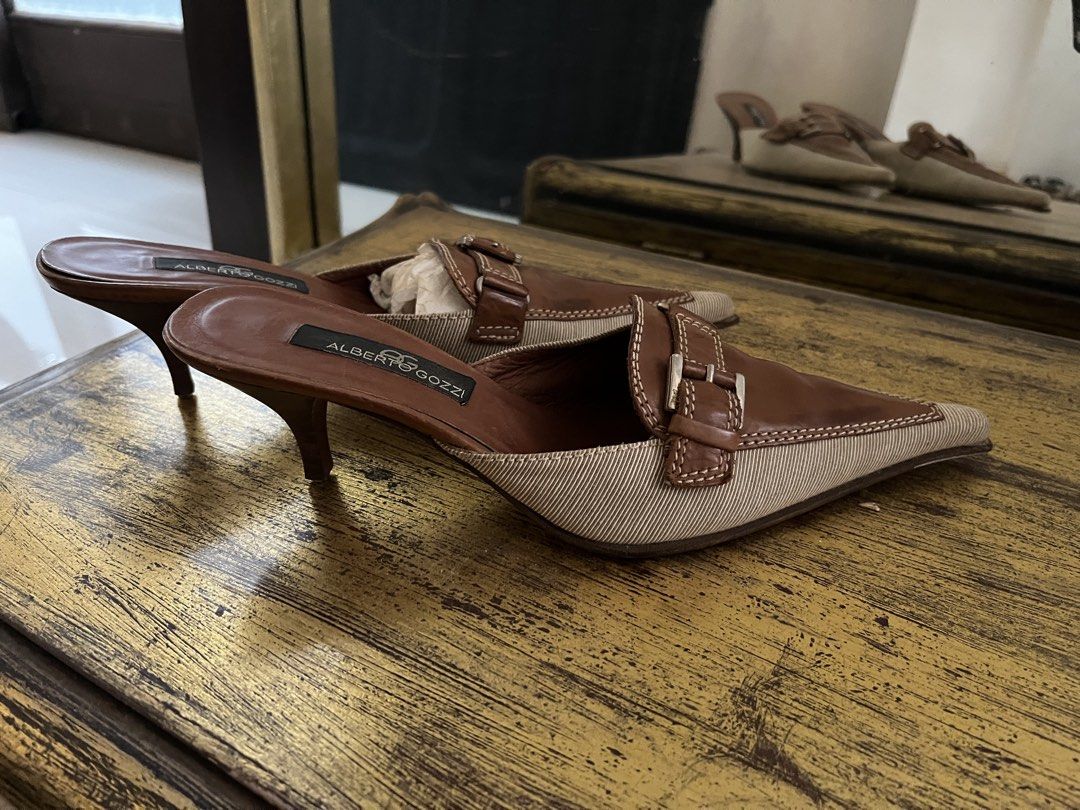Alberto Gozzi Pointed Mule Heels (Category: Heels) located in Muntinlupa City. Submitted by jane226ph (Listing ID 1466056367, Image 2). Description: Original Classic pointed mule kitten heels. Leather and fabric material with detailed stitching. Timeless piece with a character. A beautiful example of the craftsmanship of its era. Heel outsole requires replacement. Priced low to reflect the condition, although the quality and craftsmanship of the 