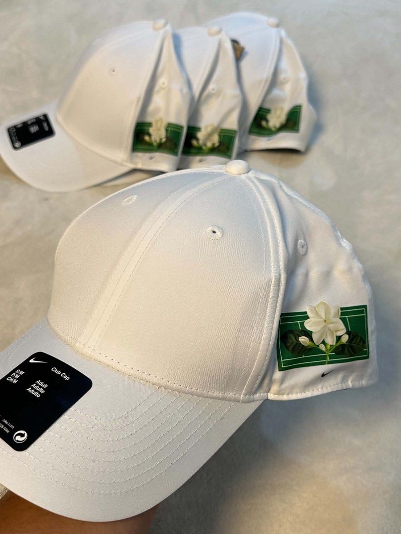 Alex Eala x Nike cap (Category: Hats & Beanies) located in Makati City. Submitted by yatche (Listing ID 1466050958, Image 3). Description: Alex Eala Limited Edition Nike Cap 🎾🇵🇭 A clean and stylish white Nike cap from the Alex Eala limited-edition collection, featuring a unique tennis-inspired design. The cap has a classic curved brim, adjustable back closure, and the iconic Nike Swoosh. The standout detail is the green tennis-court-inspired p