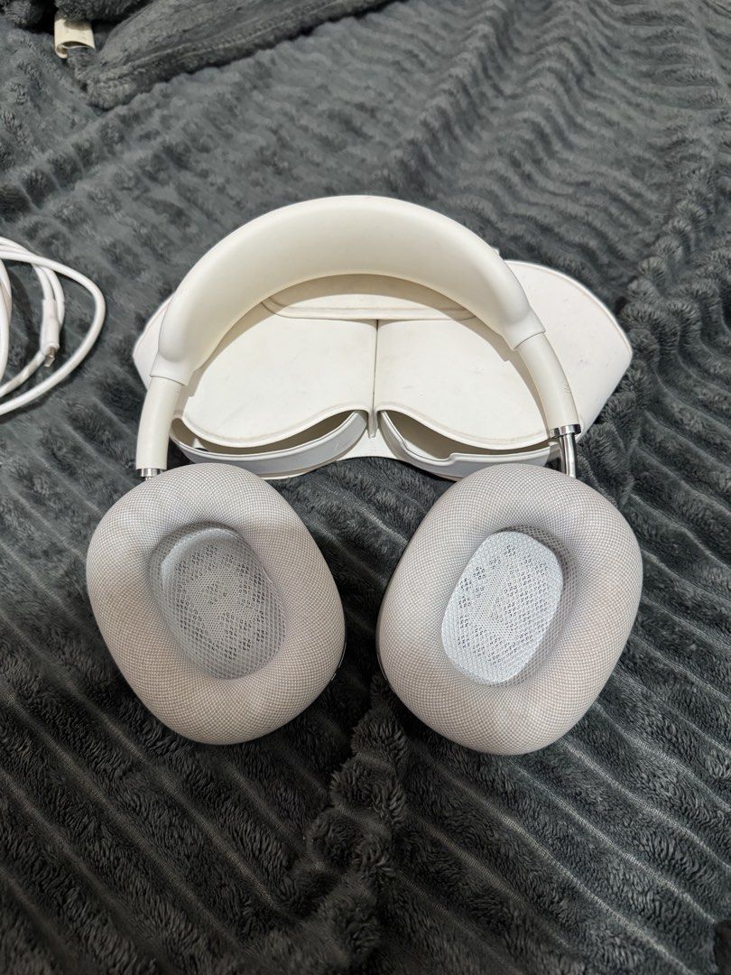 Apple AirPods Max Silver with Case and Cable (Category: Headphones & Headsets) located in Quezon City. Submitted by bananacakes09174 (Listing ID 1465957442, Image 3). Description: - Authentic Silver Apple AirPods Max over-ear headphones 1st Generation - Includes matching Smart Case and white charging cable - Features detachable mesh ear cushions with L/R labels and interior driver pinholes - Condition: Normal handling wear with minor discoloratio
