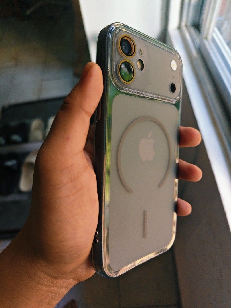 Apple iPhone 12 64GB black (Category: iPhone 12 Series) located in Malabon City. Submitted by haileysmit70567 (Listing ID 1465958411, Image 2). Description: - Model: Apple iPhone 12 (MGJ53ZP/A) - Color: Green - Storage Capacity: 64GB - Software: Running iOS 18.6.2 - Camera: Dual rear setup with decorative lens protectors installed - Display: Clean screen, fully functional - Inclusion: Clear MagSafe-compatible protective case - Condition: Excellen