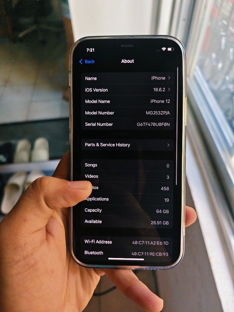 Apple iPhone 12 64GB black (Category: iPhone 12 Series) located in Malabon City. Submitted by haileysmit70567 (Listing ID 1465958411, Image 3). Description: - Model: Apple iPhone 12 (MGJ53ZP/A) - Color: Green - Storage Capacity: 64GB - Software: Running iOS 18.6.2 - Camera: Dual rear setup with decorative lens protectors installed - Display: Clean screen, fully functional - Inclusion: Clear MagSafe-compatible protective case - Condition: Excellen