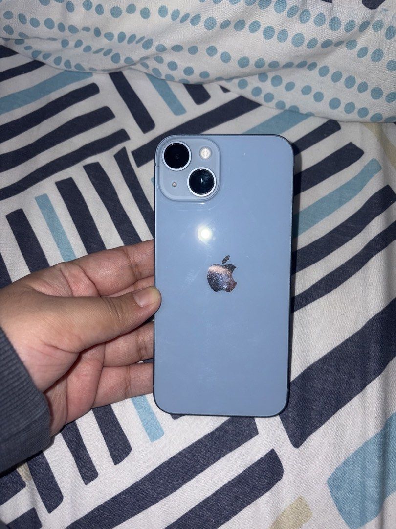 Apple iPhone 14 Blue (Category: iPhone 14 Series) located in Las Pinas. Submitted by summerrsault (Listing ID 1466121668, Image 1). Description: Apple iPhone 14 512GB — ₱21,000 (negotiable) Selling my personal iPhone 14, 512GB. All parts are original and the phone has never been repaired or opened. • 512GB storage • 78% battery health, original battery • Original screen, never replaced • Fully functional, no issues • Minor hairline scratches on t