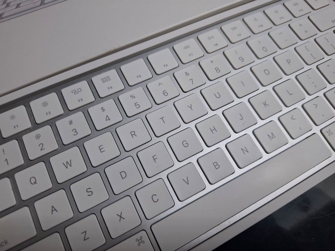 Apple Magic Keyboard with Numeric Keypad (Category: Computer Keyboard) located in Taguig. Submitted by hanniedew (Listing ID 1466104210, Image 2). Description: - Authentic Apple Magic Keyboard with Numeric Keypad (Silver) - Standard QWERTY layout with full arrow keys and numeric pad - Sleek white keys with a durable aluminum frame - Comes complete with original box, Lightning to USB cable, and documentation - Plug-and-play ready and in excellent,