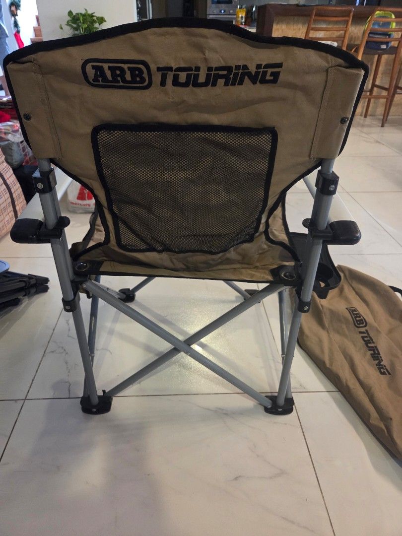 ARB Touring Camping Chair with Table (Category: Hiking & Camping) located in Makati City. Submitted by kanixa (Listing ID 1465993603, Image 2). Description: Upgrade your outdoor setup with the premium ARB Touring Camping Chair and Table set! - Authentic ARB gear with matching carry bag (Part No. 10500101A) - Built-in side table for your drinks, phone, or snacks - Heavy-duty, foldable steel frame for maximum durability - Stylish and tough tan and 