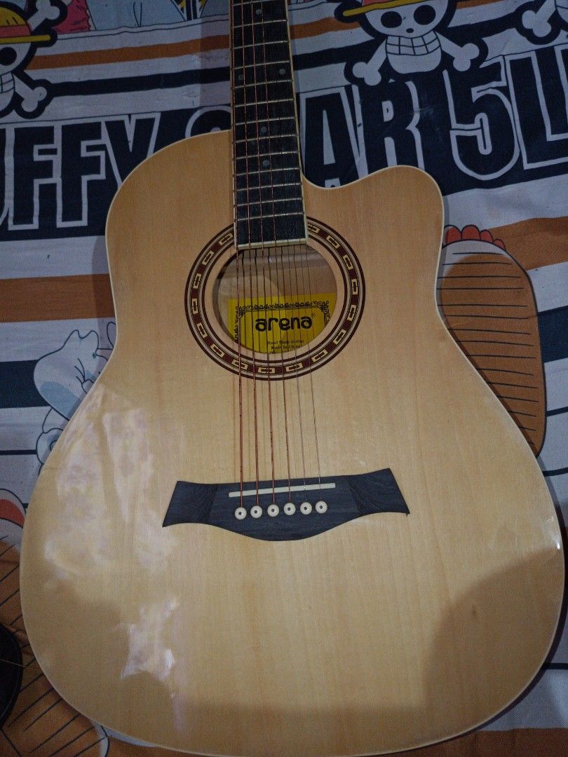 ARENA guitar, 38c (Category: Musical Instruments) located in Lubao. Submitted by evaagayllee (Listing ID 1466080787, Image 1). Description: NEW NA STRING NIYA, HINDI NA KATULAD NUNG SA PIC. I used the strings na nasa image. May mga freebies. Acoustic.