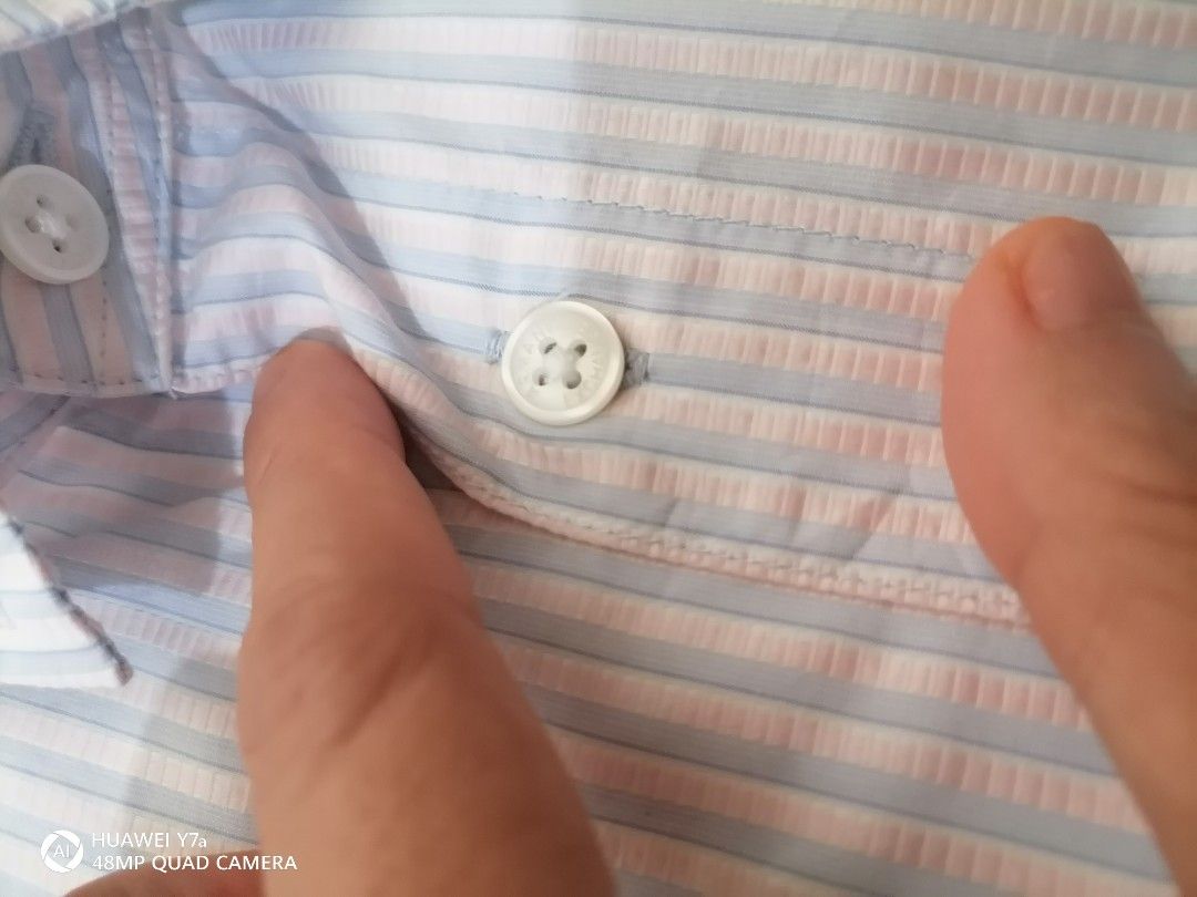 Armani Exchange Slim Fit Striped Button-Down Shirt Size S (Category: Tshirts & Polo Shirts ) located in Naga. Submitted by mrwisethrifter (Listing ID 1465984574, Image 3). Description: - Brand: Armani Exchange - Style: Slim fit long sleeve button-down shirt - Pattern: Blue and white vertical stripes - Size: S/P - Details: Classic collar, branded front and cuff buttons - Condition: Clean fabric throughout, well-maintained.