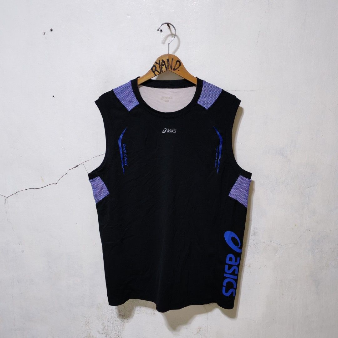Asics Track and Field Black Blue Singlet (Category: Activewear) located in Manila. Submitted by ryandip88861707 (Listing ID 1465957455, Image 1). Description: - Authentic Asics track and field tank top in black and blue - Breathable purple patterned mesh panels on shoulders and back yoke for ventilation - Large vertical Asics logo on the bottom left hem and 'Track & Field' text on the front right chest - Lightweight, high-performance athletic mat
