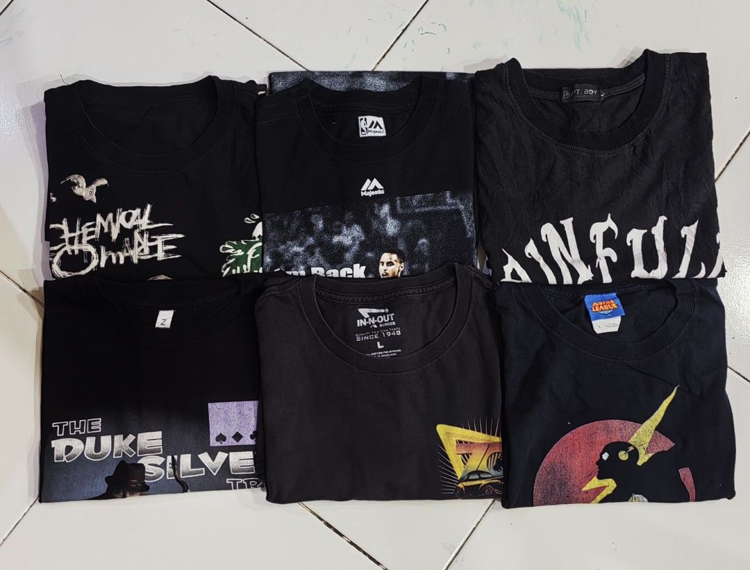 Assorted Black Band and Graphic T-Shirts (Category: Tshirts & Polo Shirts ) located in Manila. Submitted by livedolphin_68dee2 (Listing ID 1466085359, Image 1). Description: - Bundle of 6 black graphic t-shirts - Features popular designs: My Chemical Romance, Majestic basketball, Painful text, The Duke Silver Trio, In-N-Out, and Justice League Flash - Assorted sizes ranging from Medium to Large - Comfortable regular fit made of breathable cotton 
