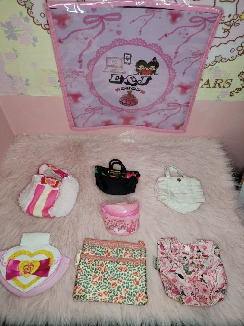 Assorted Cute Pouches and Mini Bags Collection (Category: Purses & Pouches) located in Paombong. Submitted by eandj.shop (Listing ID 1466040126, Image 2). Description: 🎀 Bundle of small bags and zip pouches in various cute designs 🎀 Includes: pink heart pouch, leopard print zip pouch, floral pouch, black mini tote, white mini tote, and pink Mezzo Piano clear case 🎀 Great for organizing small items and accessorizing 🎀 Sold as a set 🎀 Message 