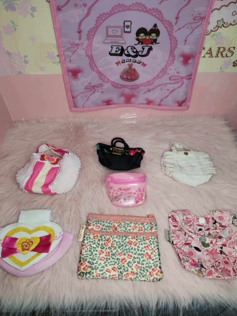 Assorted Cute Pouches and Mini Bags Collection (Category: Purses & Pouches) located in Paombong. Submitted by eandj.shop (Listing ID 1466040126, Image 1). Description: 🎀 Bundle of small bags and zip pouches in various cute designs 🎀 Includes: pink heart pouch, leopard print zip pouch, floral pouch, black mini tote, white mini tote, and pink Mezzo Piano clear case 🎀 Great for organizing small items and accessorizing 🎀 Sold as a set 🎀 Message 