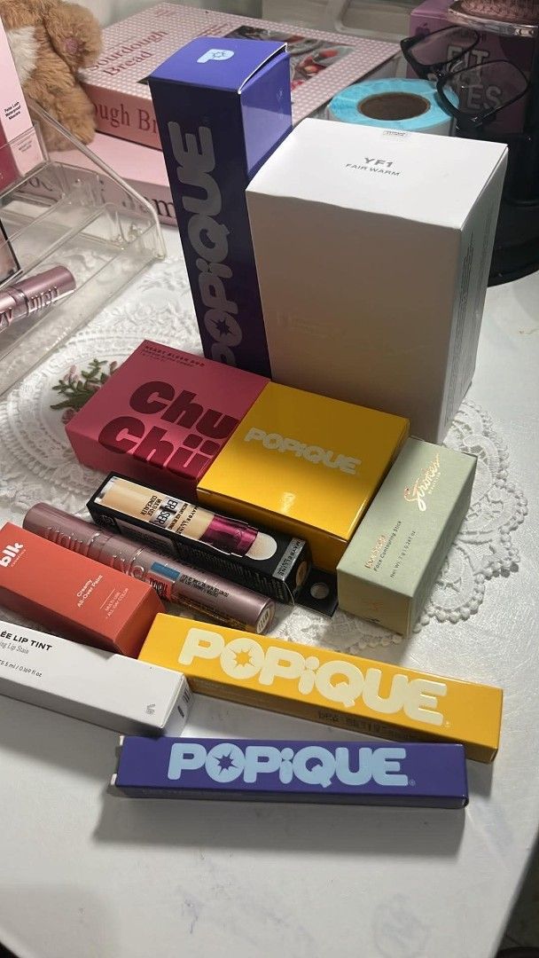 Assorted Makeup and Cosmetics Products Bundle (Category: Makeup) located in Caloocan City. Submitted by caramelmacchiato555 (Listing ID 1466042128, Image 1). Description: - All-in-one makeup haul set - Includes Popique products, Maybelline concealer & mascara, Chu Chu blush duo, and Strokes contour stick - 100% brand new, unopened, and unused - Selling as a complete set.