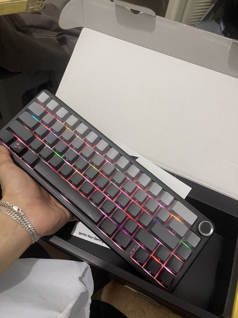 Attack Shark X66 Mechanical Keyboard RGB Tri-Mode (Category: Computer Keyboard) located in Manila. Submitted by gabsy122 (Listing ID 1466116357, Image 3). Description: - Model: Attack Shark X66 Mechanical Keyboard - Colorway: Sleek Black and Grey - Connectivity: Tri-mode (2.4G Wireless, Bluetooth, and Wired) - Layout & Build: 66-key compact layout with a premium gasket structure - Features: Convenient volume knob and vibrant, customizable RGB lig