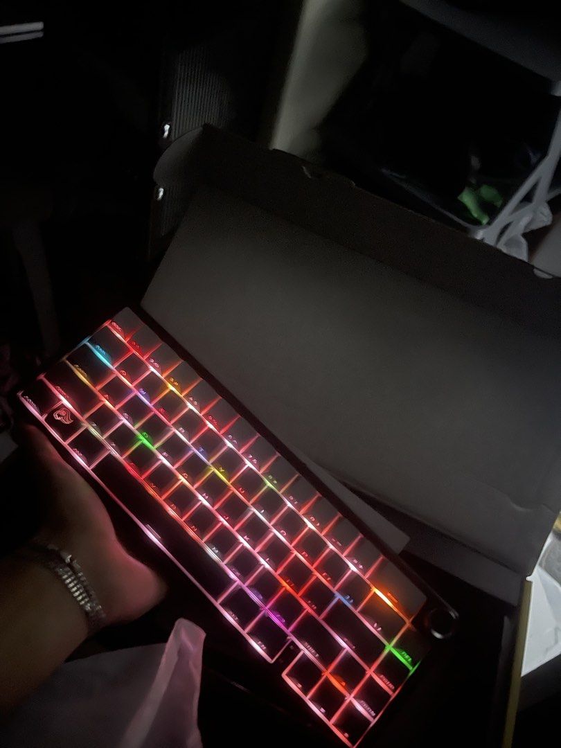 Attack Shark X66 Mechanical Keyboard RGB Tri-Mode (Category: Computer Keyboard) located in Manila. Submitted by gabsy122 (Listing ID 1466116357, Image 2). Description: - Model: Attack Shark X66 Mechanical Keyboard - Colorway: Sleek Black and Grey - Connectivity: Tri-mode (2.4G Wireless, Bluetooth, and Wired) - Layout & Build: 66-key compact layout with a premium gasket structure - Features: Convenient volume knob and vibrant, customizable RGB lig