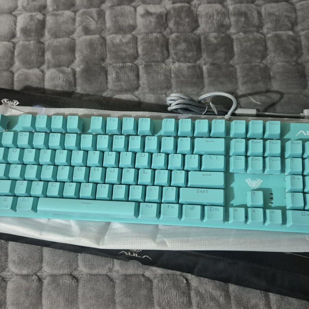 AULA S2022 Mechanical Gaming Keyboard (Category: Computer Keyboard) located in Quezon City. Submitted by yoondeclutters (Listing ID 1465964919, Image 1). Description: AULA S2022 Mechanical Gaming Keyboard Brand new. Never used. Got it as a freebie for buying new laptop at GameXtreme. Comes with box! Price is slightly negotiable. Loc: Fairview, Quezon City.