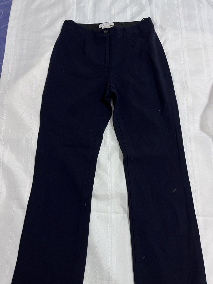 Auth Celine Black Trousers Pants (Category: Other Bottoms) located in Baguio. Submitted by gbwardrobe (Listing ID 1466093386, Image 3). Description: - Brand: Celine - Color: Classic Black - Style: Tailored trousers with clean lines - Details: Front button closure and belt loops - Authenticity: Designer label stitched inside waistband - Occasion: Ideal for work, office wear, or formal settings 25-26in.