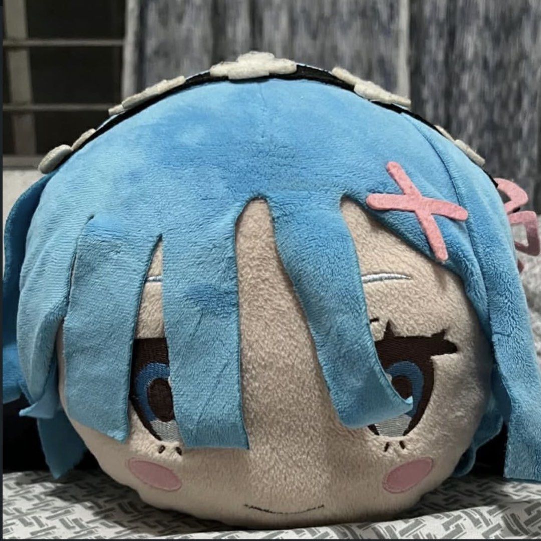 Authentic Banpresto Rem Re:Zero Lying Plush (Category: Plushies & Soft Toys) located in Malabon City. Submitted by c4rreyfied (Listing ID 1465990760, Image 1). Description: - Official SEGA/Banpresto plush toy with tag attached - Condition: 8/10, slight dirt on plush but can be washed - MOP: GCash only.