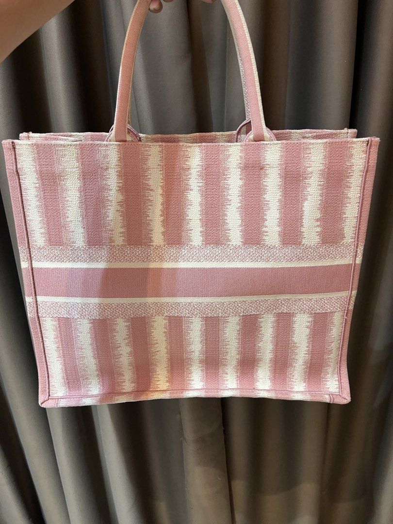 authentic christian dior booktote (Category: Luxury Bags & Wallets) located in Manila. Submitted by luxuryitems_bybosst (Listing ID 1466090800, Image 3). Description: excellent condition slightly nego location capitol hills quezon city walk in are welcome.