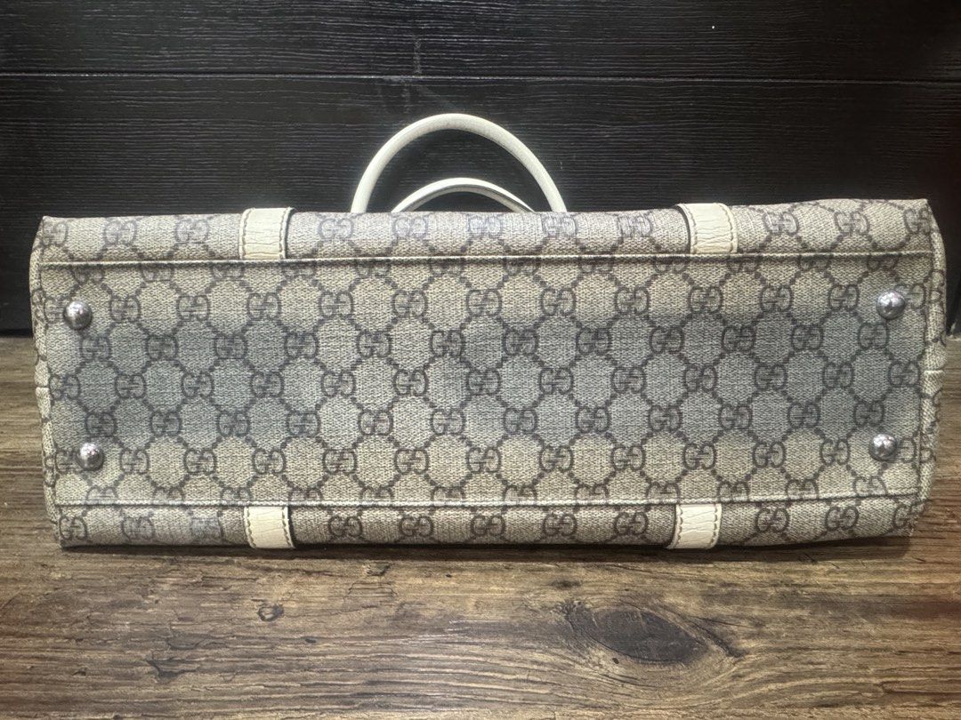 AUTHENTIC GUCCI GG SUPREME JOY TOTE – WHITE (Category: Luxury Bags & Wallets) located in Quezon City. Submitted by tag_sale_bargains (Listing ID 1465971738, Image 3). Description: Pre-loved / good condition Genuine Gucci GG Supreme coated canvas with white leather trim. Clean interior, sturdy structure, minimal signs of use. Price slightly negotiable for sure buyer. - Will include a generic dust bag .