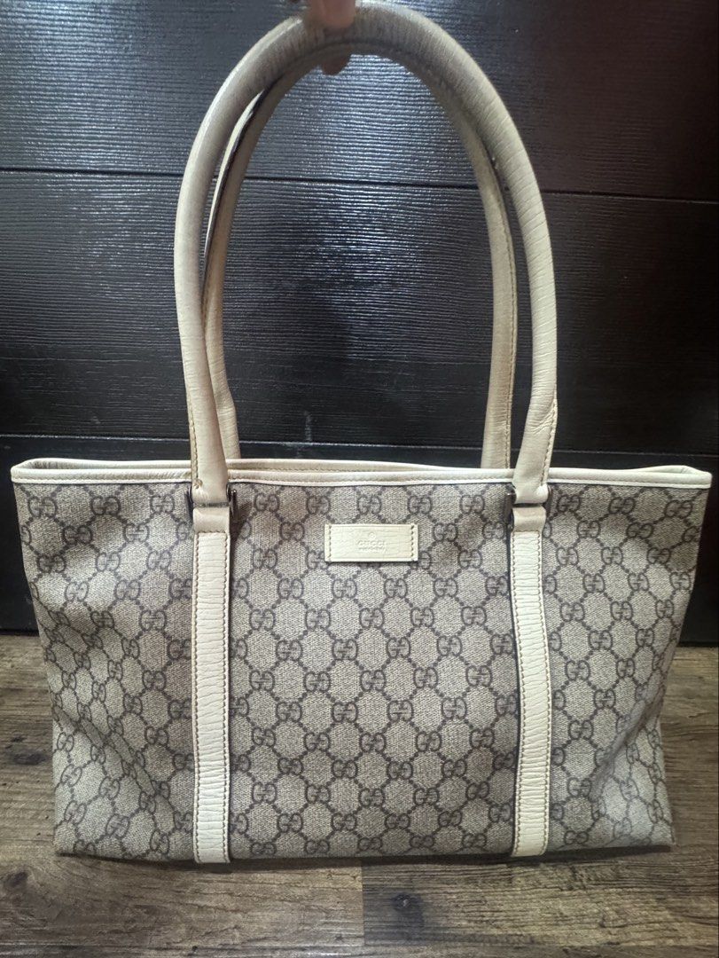 AUTHENTIC GUCCI GG SUPREME JOY TOTE – WHITE (Category: Luxury Bags & Wallets) located in Quezon City. Submitted by tag_sale_bargains (Listing ID 1465971738, Image 1). Description: Pre-loved / good condition Genuine Gucci GG Supreme coated canvas with white leather trim. Clean interior, sturdy structure, minimal signs of use. Price slightly negotiable for sure buyer. - Will include a generic dust bag .