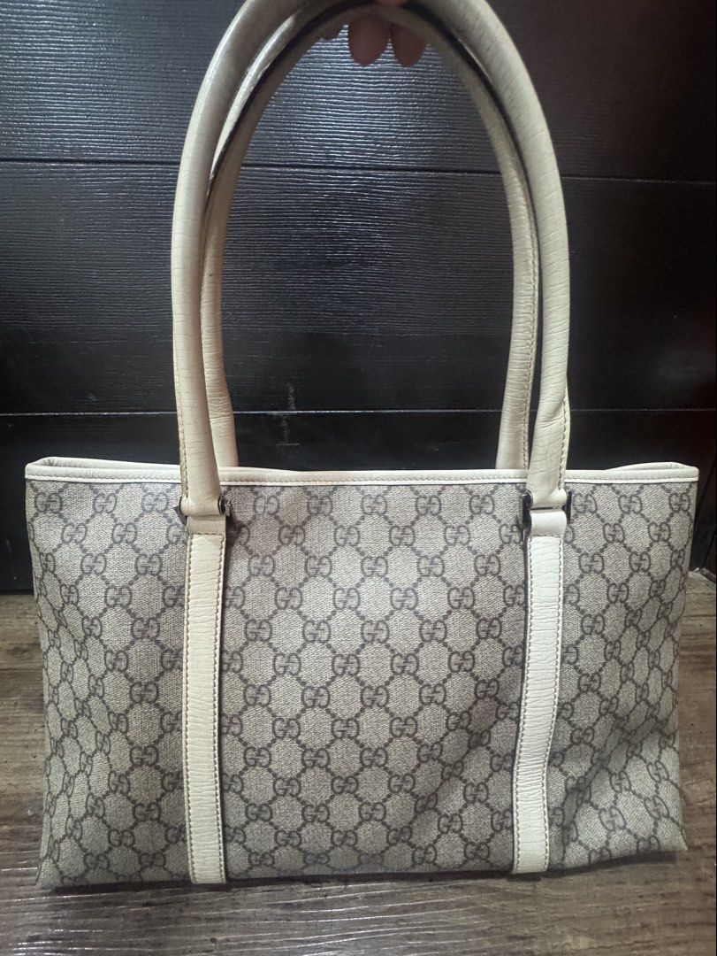 AUTHENTIC GUCCI GG SUPREME JOY TOTE – WHITE (Category: Luxury Bags & Wallets) located in Quezon City. Submitted by tag_sale_bargains (Listing ID 1465971738, Image 2). Description: Pre-loved / good condition Genuine Gucci GG Supreme coated canvas with white leather trim. Clean interior, sturdy structure, minimal signs of use. Price slightly negotiable for sure buyer. - Will include a generic dust bag .