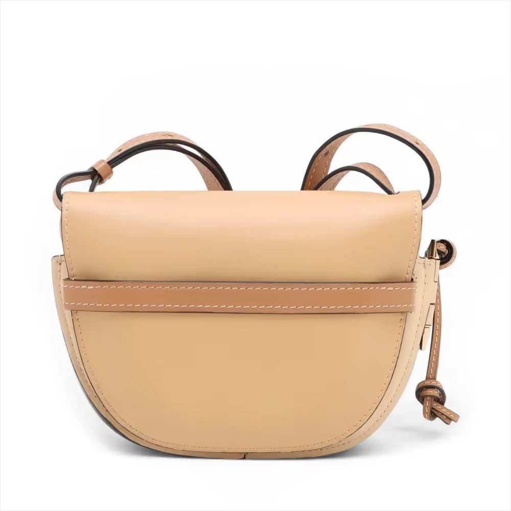 Authentic Loewe Gate Bag Small Leather Shoulder Bag Beige (Category: Shoulder Bags) located in General Trias. Submitted by japan_secondhand_products (Listing ID 1466052867, Image 2). Description: This item has some inconspicuous stains and minor scratches. There is a slight amount of glitter on the surface and the edges of the shoulder strap are slightly sticky. *As this is a used item, there may be scratches, stains, etc. not mentioned in the de