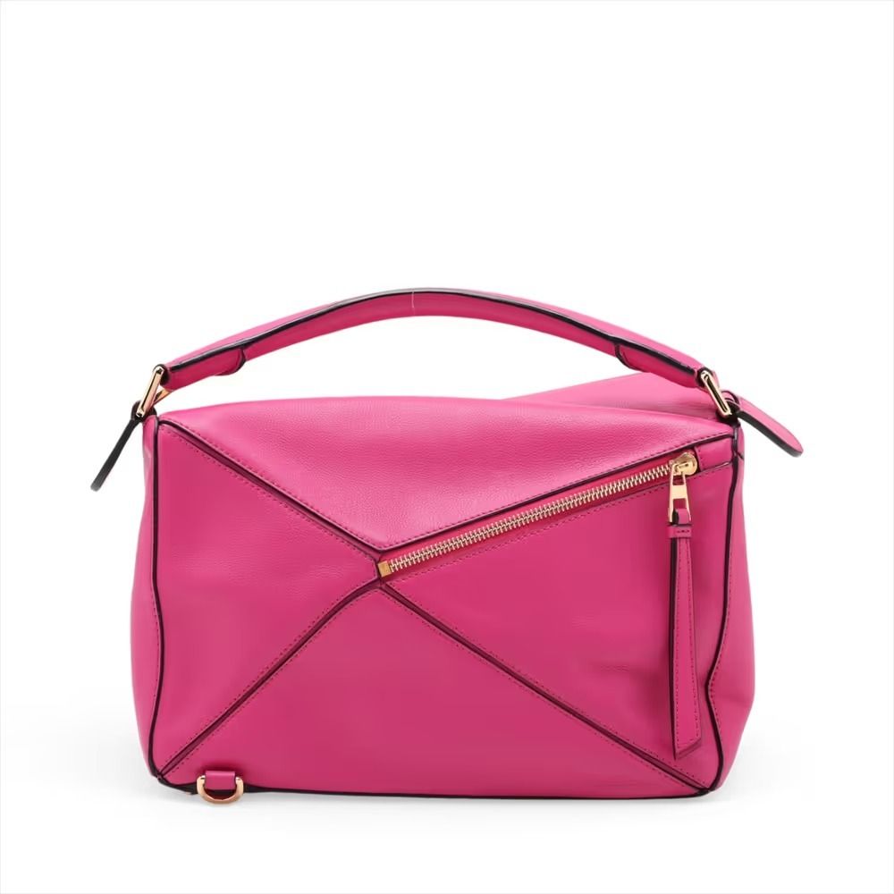 Authentic Loewe Puzzle Medium Leather 2-Way Shoulder Bag, Pink (Category: Shoulder Bags) located in General Trias. Submitted by japan_secondhand_products (Listing ID 1466049262, Image 2). Description: This item has some minor stains and scratches that are not very noticeable. There is a storage odor. *As this is a used item, there may be scratches or stains not mentioned in the description. Please understand this beforehand. Product Rank AB brand