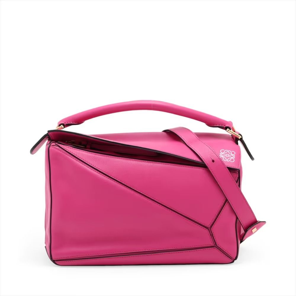 Authentic Loewe Puzzle Medium Leather 2-Way Shoulder Bag, Pink (Category: Shoulder Bags) located in General Trias. Submitted by japan_secondhand_products (Listing ID 1466049262, Image 1). Description: This item has some minor stains and scratches that are not very noticeable. There is a storage odor. *As this is a used item, there may be scratches or stains not mentioned in the description. Please understand this beforehand. Product Rank AB brand