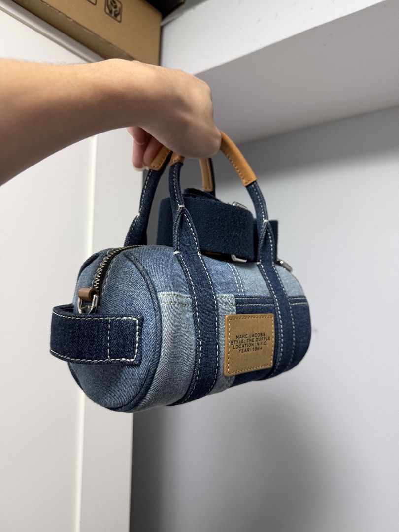 authentic marc jacobs mini denim duffle bag (Category: Luxury Bags & Wallets) located in Manila. Submitted by gavsmd (Listing ID 1466145179, Image 2). Description: Authentic Limited Release Marc Jacobs mini duffle bag w reciept and dustbag, paperbag bought @ greenbelt makati.