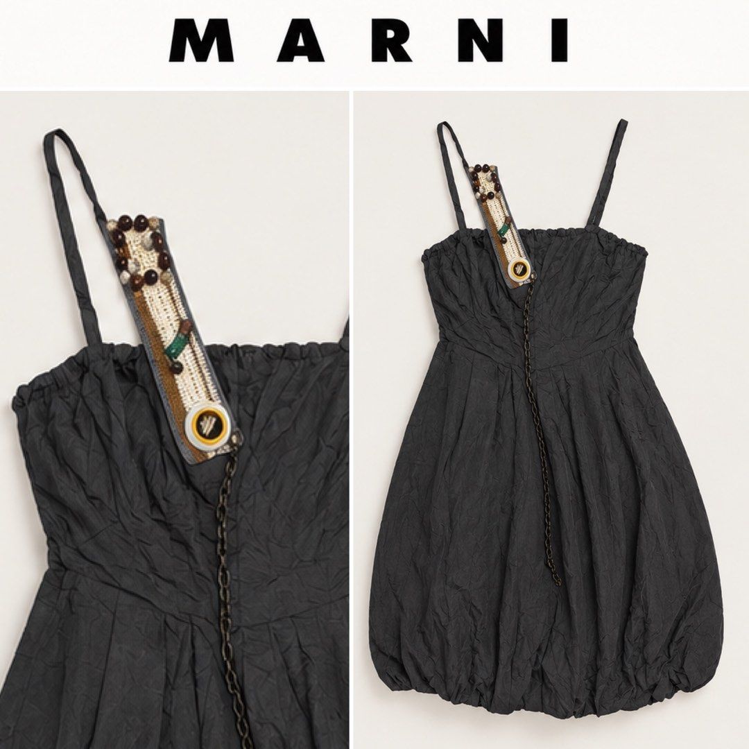 Authentic Marni Silk Beaded Strap Bubble Dress Size 36 (Category: Dresses) located in Amlan (Ayuquitan). Submitted by pringpring (Listing ID 1466128777, Image 1). Description: - Brand: Marni - Color: Dark Grey - Material: Silk - Size: 36 (Store tag attached) - Condition: Brand new, never worn, pristine - Style: Sleeveless bubble hem with spaghetti straps - Special Detail: Unique strap adorned with crochet, wooden beads, stones, and a dangling cha