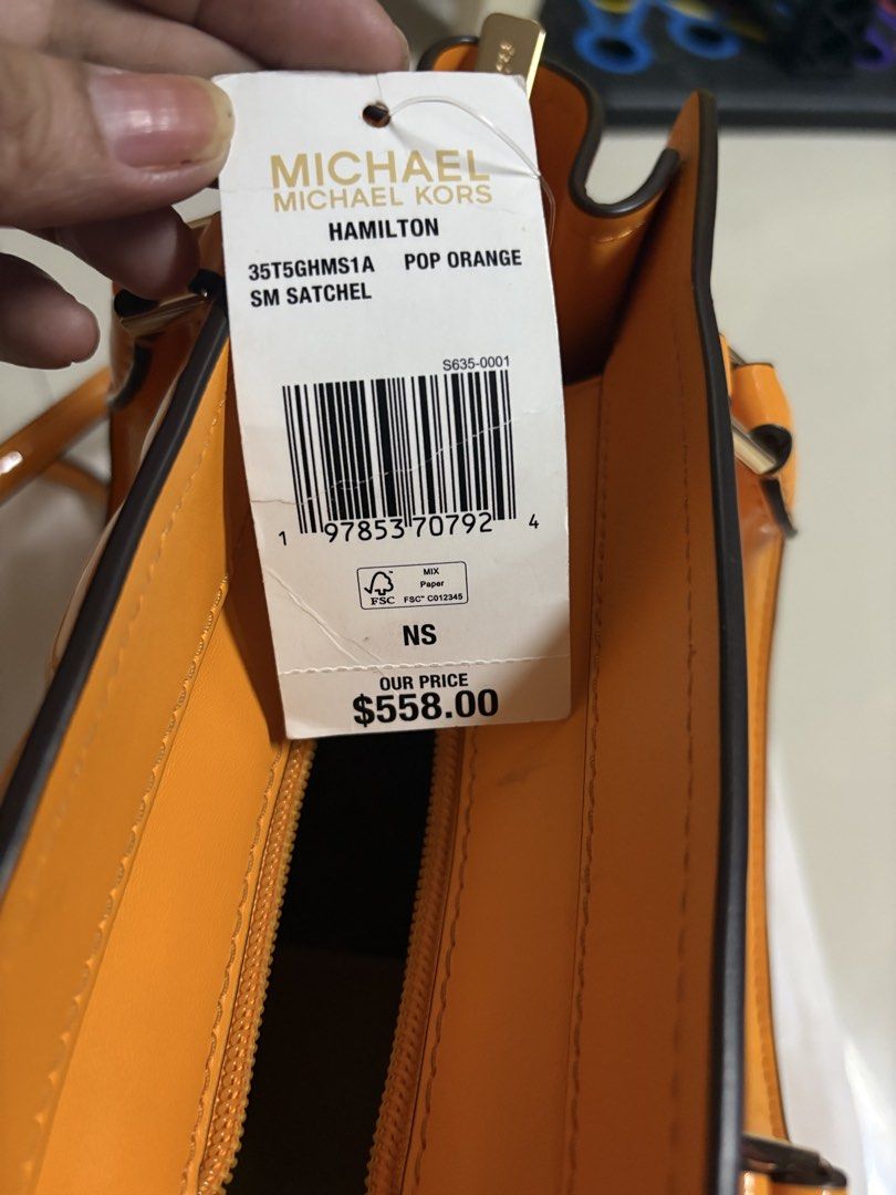 Authentic Michael Kors Hamilton Satchel (Category: Luxury Bags & Wallets) located in Antipolo. Submitted by cherrylblossom (Listing ID 1465992225, Image 3). Description: Authentic Michael Kors Hamilton Satchel in Pop Orange Patent Leather New but ni wrap With Tag and Carecard and Paperbag Selling Low .