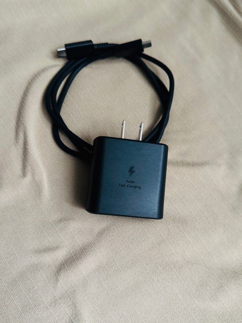 Authentic Samsung 25W / 45W Type-C Fast Charger (Category: Chargers & Cables) located in Manila. Submitted by bloodyrain (Listing ID 1465997335, Image 1). Description: Authentic Samsung 25W / 45W Type-C fast charger in black. Comes with a Type-C to Type-C cable. Excellent working condition. Meetups available at LRT1 Doroteo Jose or LRT2 Recto stations..