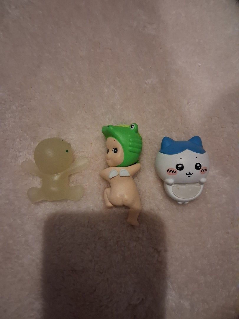 Authentic Sonny Angels, Smiskis, & Chiikawa Set (Category: Designer & Blind Box Toys) located in Manila. Submitted by kudos_ (Listing ID 1466127929, Image 3). Description: - Taking GCash only Take all for 2000php PRICES (INDIVIDUAL): 1. sitting smiski - 350 2. thumbs up smiski - 350 3. smiski melting hipper - 350 4. chiikawa hipper - 350 5. sonny angel gray cat - 250 (SOLD) 6. sonny angel skunk - 350 7. sonny angel crocodille hipper - 350 No rese