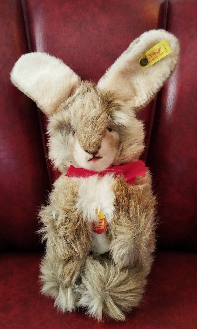 Authentic Steiff Ossi Rabbit (Category: Vintage Collectibles) located in Iloilo. Submitted by pinspirewitha (Listing ID 1466012220, Image 2). Description: 🐰✨ AUTHENTIC STEIFF "OSSI" BUNNY – with Original Tags! ✨🐰 Collectors, this one's for you. A genuine Steiff rabbit with the "Knopf im Ohr" metal button and yellow ear tag, plus the original red chest tag, still attached. 🇩🇪 Ossi sits at about 13" tall and 4" wide. Never played with, just lov