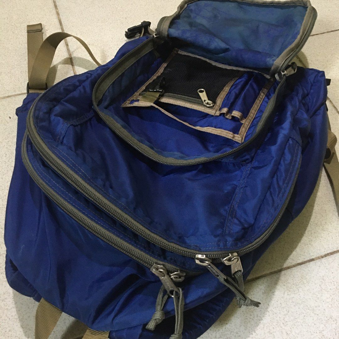 Authentic Vintage l.l.bean Original Book Pack Backpack Royal Blue (Category: Backpacks) located in Makati City. Submitted by tasteofluxury (Listing ID 1465996954, Image 3). Description: Authentic Vintage L.L.Bean Original Book Pack Backpack Royal Blue Color: Royal Blue with Reflective Stripe Origin: Made in Philippines (90s Vintage - Collectible) Material: Heavy-duty nylon, water-resistant Compartments: 3 zip compartments + front organizer pocket