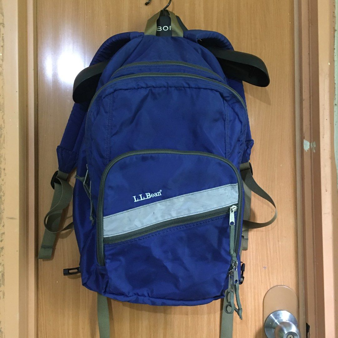 Authentic Vintage l.l.bean Original Book Pack Backpack Royal Blue (Category: Backpacks) located in Makati City. Submitted by tasteofluxury (Listing ID 1465996954, Image 1). Description: Authentic Vintage L.L.Bean Original Book Pack Backpack Royal Blue Color: Royal Blue with Reflective Stripe Origin: Made in Philippines (90s Vintage - Collectible) Material: Heavy-duty nylon, water-resistant Compartments: 3 zip compartments + front organizer pocket