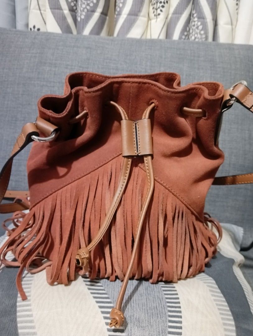 B. Makowsky Suede Fringe Bucket Bag (Category: Cross-body Bags) located in Hermosa. Submitted by chic2315 (Listing ID 1466063567, Image 1). Description: B.Makowsky Suede Fringe bucket bag. Made of genuine suede. Almost new condition. Used only twice, then store. Decluttering .