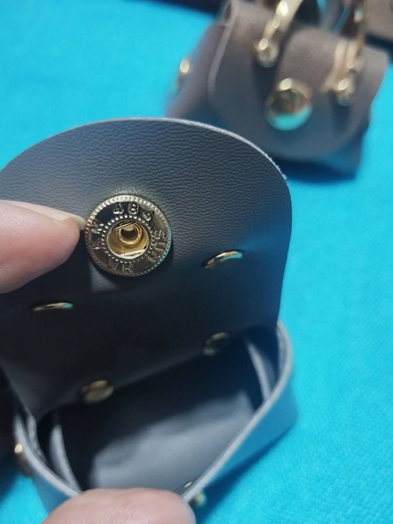 Bag Charms (Category: Shoulder Bags) located in Las Pinas. Submitted by jpmshoppe (Listing ID 1466045425, Image 3). Description: Bag charms in different colors Can be use as coin purse, airpods/earbuds case, key chain, etc Leather material.