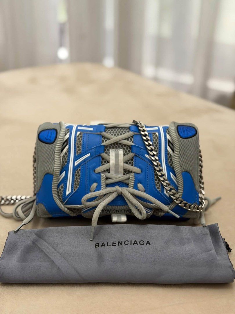 Balenciaga Sneakerhead Clutch/ Shoulder Bag (Category: Luxury Bags & Wallets) located in Manila. Submitted by ianreys (Listing ID 1466110655, Image 1). Description: Balenciaga Sneakerhead Clutch/ Shoulder Bag 💯% Authentic W/ provides dust bag only .