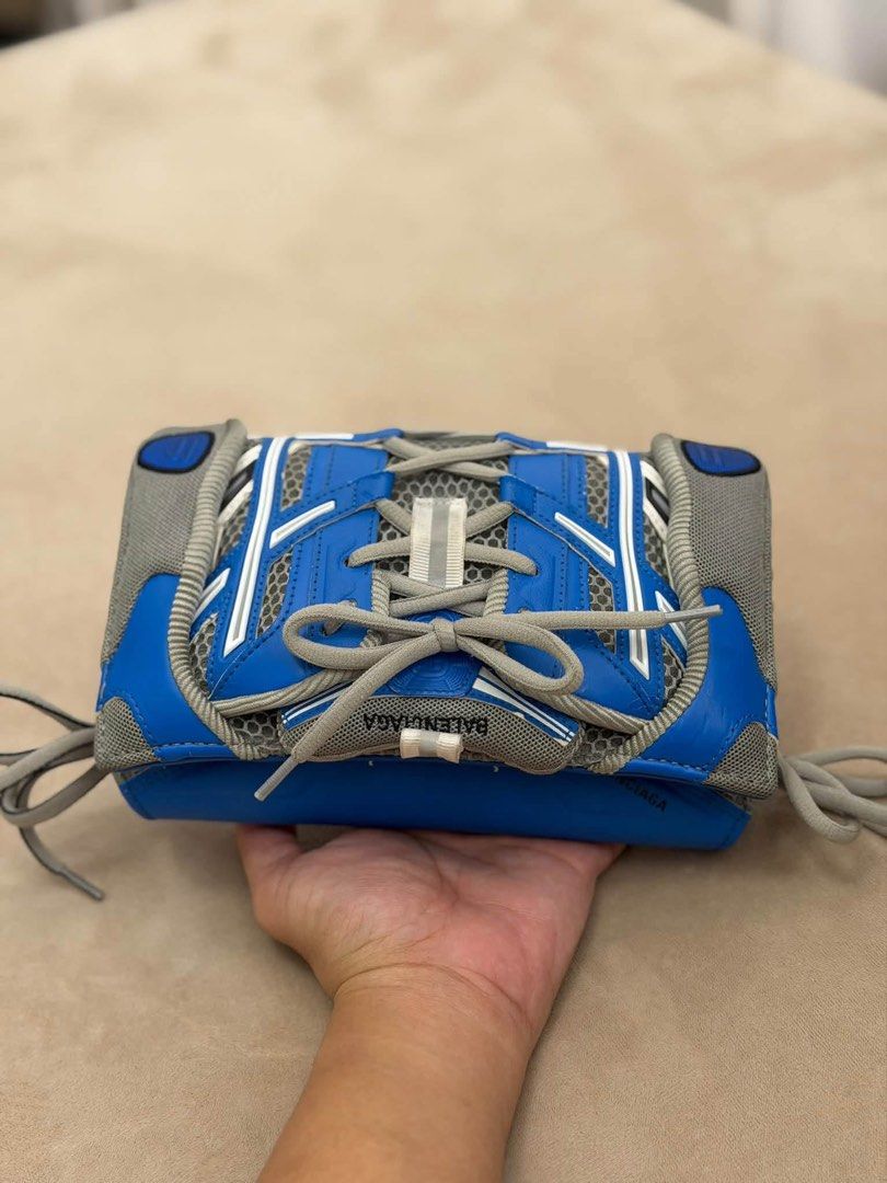 Balenciaga Sneakerhead Clutch/ Shoulder Bag (Category: Luxury Bags & Wallets) located in Manila. Submitted by ianreys (Listing ID 1466110655, Image 2). Description: Balenciaga Sneakerhead Clutch/ Shoulder Bag 💯% Authentic W/ provides dust bag only .