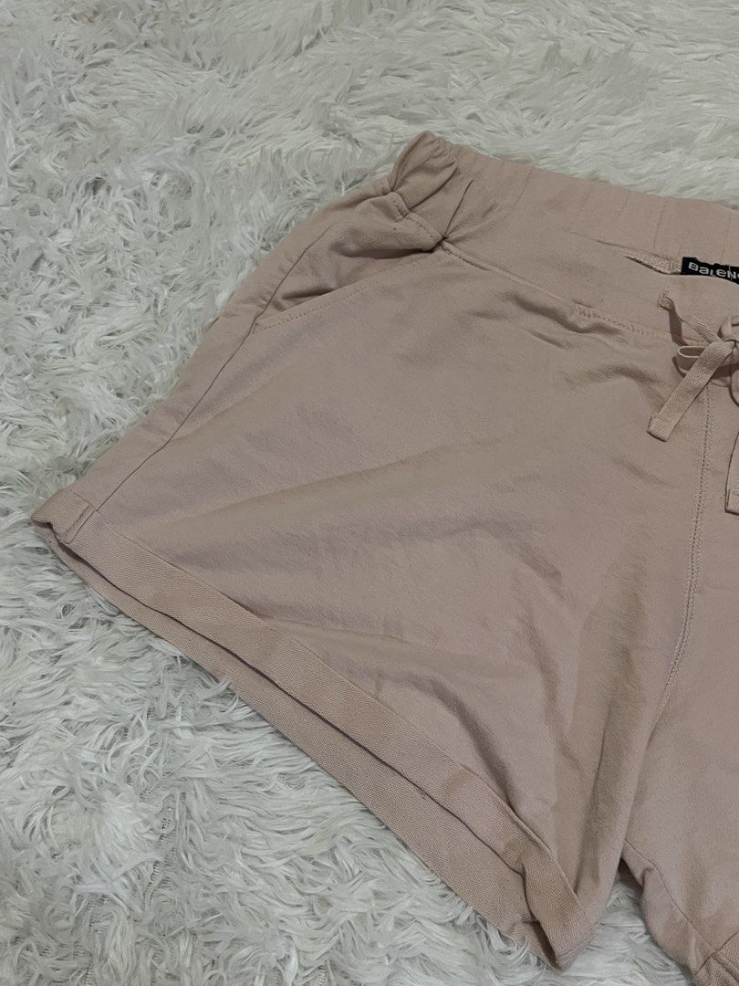 Baleno Pink Drawstring Lounge Shorts (Category: Shorts) located in Tuguegarao City. Submitted by love_clothies (Listing ID 1465995030, Image 2). Description: - Brand: Baleno - Color: Light Pink - Material: Soft cotton-blend jersey fabric - Features: Elastic waistband with matching drawstring, convenient side pockets, and stylish rolled cuffs - Best for: Lounging at home or casual daily errands - Condition: Brand new/Excellent (Ready to ship) - Wi