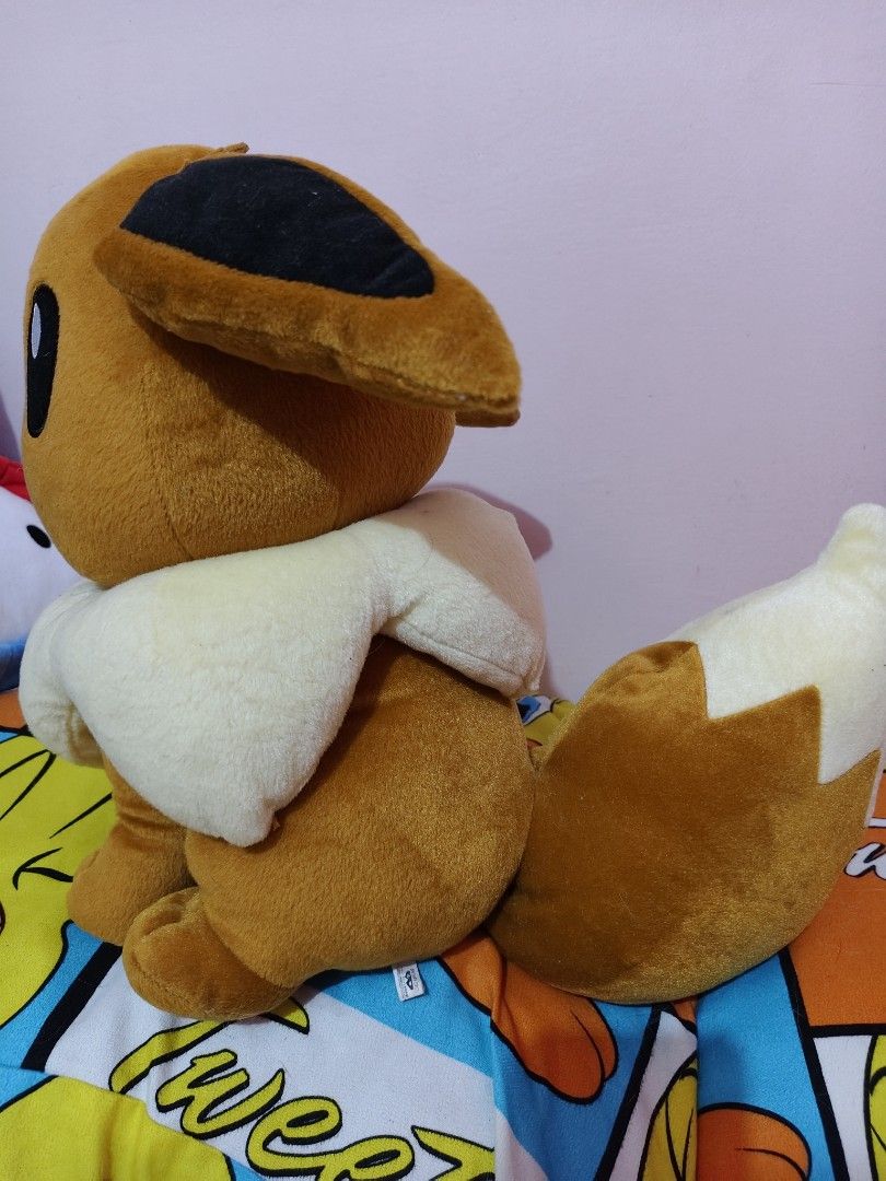 Banpresto Eevee Pokémon Plush Stuffed Toy (Category: Plushies & Soft Toys) located in Manila. Submitted by kopishop1109 (Listing ID 1466081881, Image 2). Description: - Authentic Banpresto Pokémon Eevee plush - Released in 2015 via Japan crane games - Features soft brown fur with a big fluffy cream ruff and tail - Original tush tag with Japanese text intact - Sits upright on its own perfectly - Clean, well-maintained, and collector-friendly.