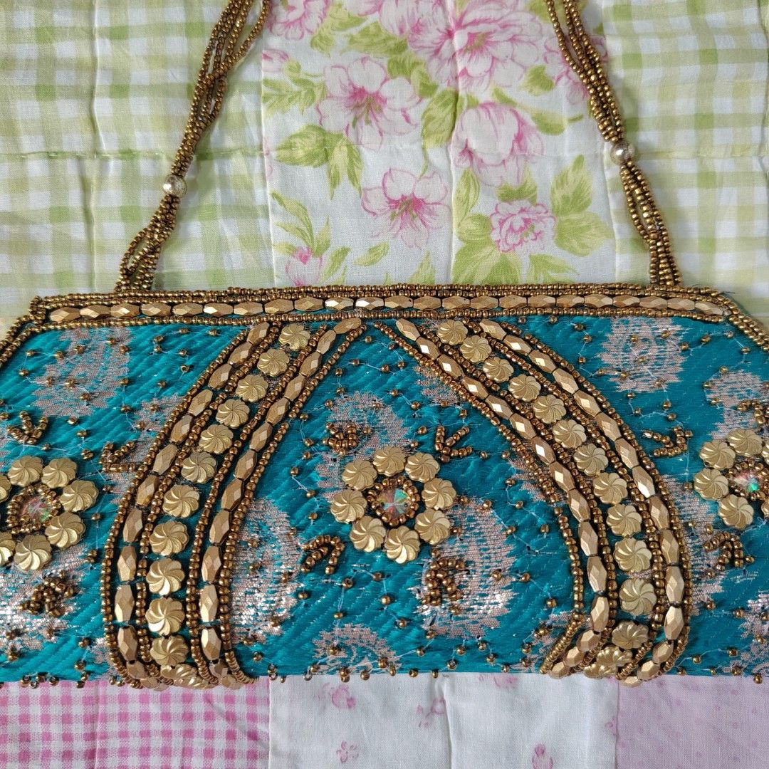 Beaded Shoulder Bag (Category: Shoulder Bags) located in Baguio. Submitted by gwynthings (Listing ID 1465992819, Image 2). Description: beaded shoulder bag dimensions — top length: 8' — bottom length: 11' — height: 4.5' (strap not included) — width: 2' — fits small items only (eg., cards, cash, lipstick) — will NOT fit a phone — shows light signs of use and minor deforming.