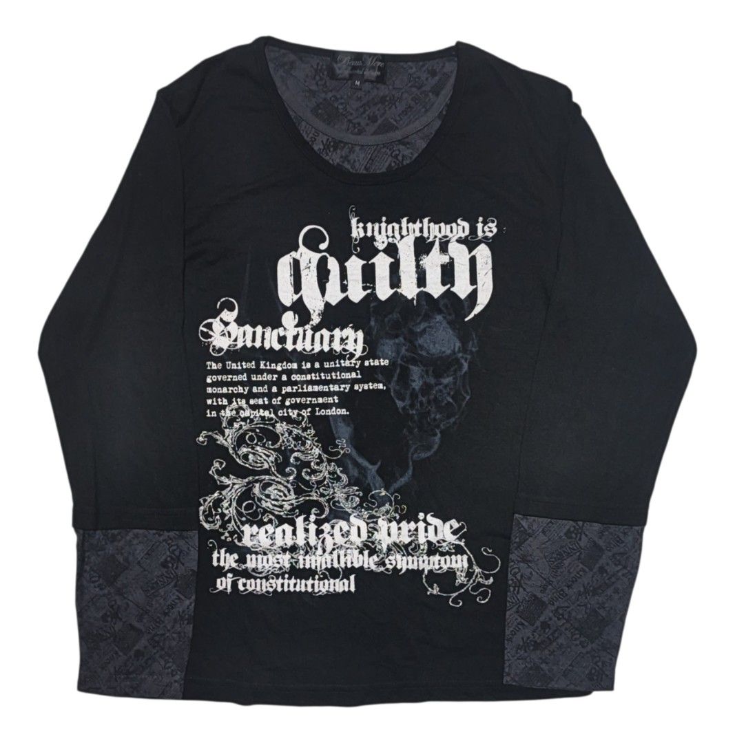 Beaumere Skull Poem Layered Longsleeve (Category: Longsleeves) located in Calabanga. Submitted by bekneegear (Listing ID 1466123645, Image 1). Description: - Color: Black with large white gothic typography prints across the chest - Details: Features phrases like 'knighthood is guilty' and 'sanctuary' - Accents: Contrasting patterned fabric panels on the cuffs and inner collar area - Neckline: Scoop neckline - Size: Tag size M - Condition: Excelle