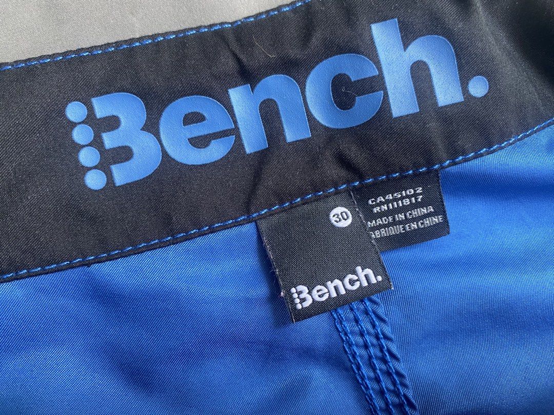 Bench Blue Board Shorts Size 30 (Category: Swim Trunks & Board Shorts) located in San Jose del Monte. Submitted by gigjhoe (Listing ID 1465987883, Image 2). Description: - Brand: Bench - Size: 30” -Length-21” - Color: Bright blue with graphic print on right leg - Details: Black inner waistband with large Bench logo, black drawstring with metal grommets - Origin: Made in China - Condition: Great option for swimming or beach days.