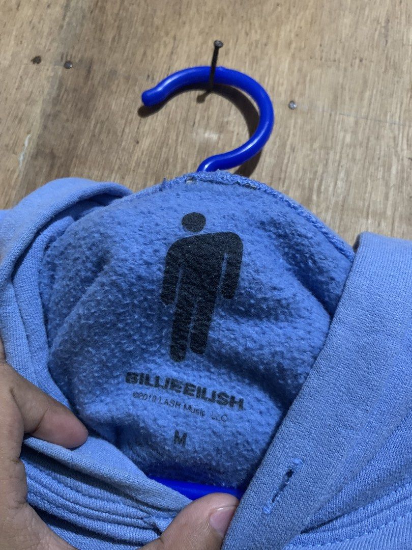BILLIE EILISH HOODIE (Category: Coats, Jackets and Outerwear) located in Naga. Submitted by glicko_reiyuki08 (Listing ID 1465973221, Image 3). Description: Billie Eilish Hoodie Measurements: Width: 21.5 Length: 26 Condition: Excellent Color rate: 9/10 Issue: Minimal stains, missing lace 400+sf.