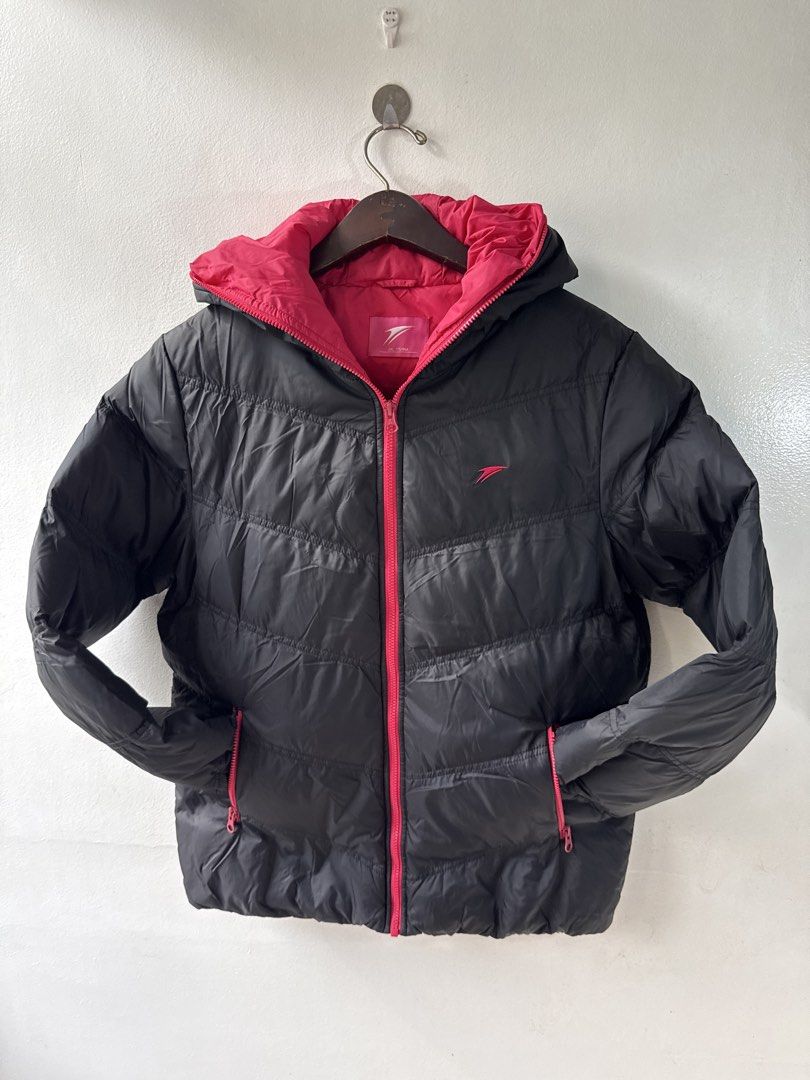 Black and Pink Puffer Jacket with Hood (Category: Coats, Jackets and Outerwear) located in Quezon City. Submitted by dropdeadprices (Listing ID 1466015462, Image 1). Description: - Color: Black with vibrant pink lining and zipper - Size: fits small to medium - Design: Quilted chevron pattern - Features: Attached hood and two zippered side pockets - Condition: Clean, thick material, excellent for cold weather and ready to wear.