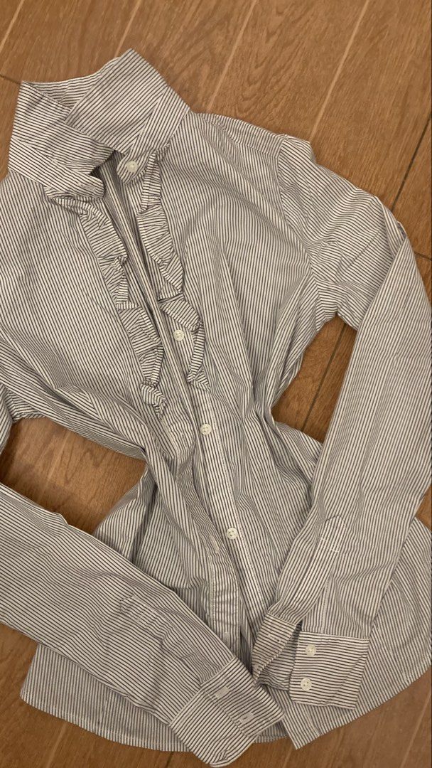 Black and white striped ruffled button-down shirt (Category: Blouses) located in Subic. Submitted by bottomjeanzgals (Listing ID 1466139662, Image 2). Description: .