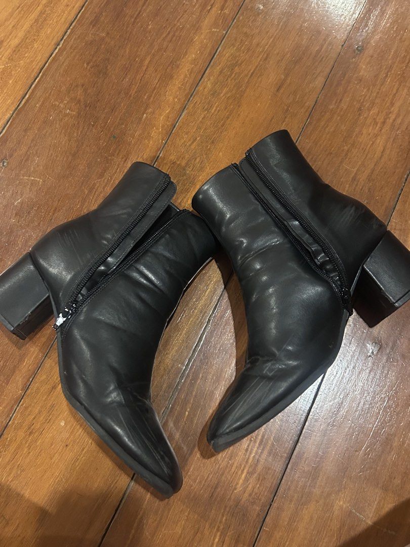 Black Ankle Boots with Block Heel (Category: Boots) located in Cebu City. Submitted by shopmikascloset (Listing ID 1466052657, Image 2). Description: Cushioned lining & sole Very comfortable Used on one trip only Purchased in Japan Perfect for cold weather - Color: Classic black - Heel: Comfortable block heel for daily walking - Closure: Convenient side zipper for easy on and off - Toe Shape: Trendy square toe - Material: Smooth synthetic with na